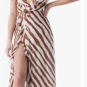 SKY dress in size Small. Never wore gorgeous.